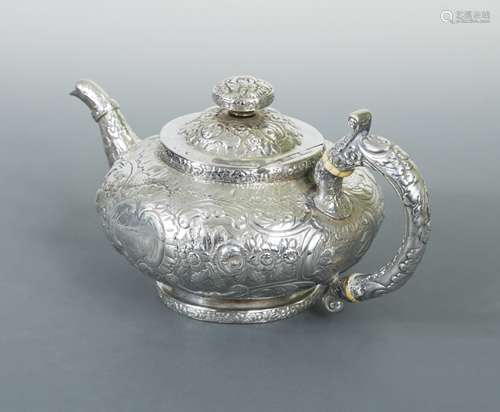 A George III silver teapot,