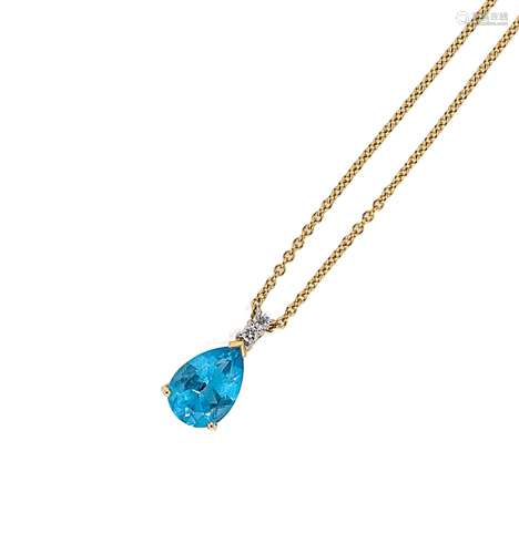 A blue topaz and diamond pendant and chain,