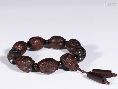 A Carved Zitan Wood Bracelet