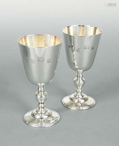 A pair of 20th century silver commemorative goblets,