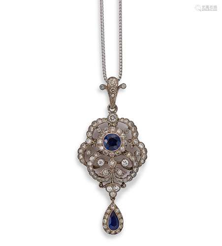 An Edwardian style diamond pendant and chain,