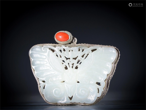 A Carved Jade Pendant