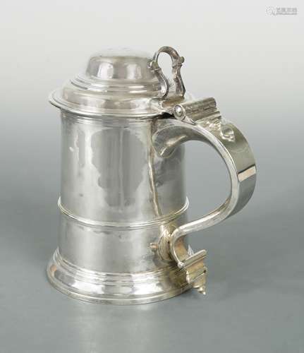 A George II silver lidded tankard,