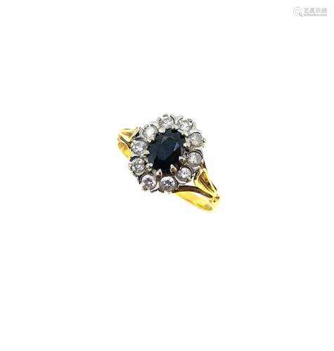 A late 20th century 18ct gold sapphire and diamond cluster r...