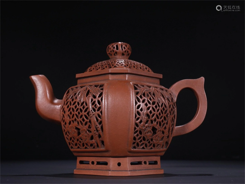 A Carved Yixing Zisha Teapot