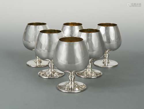 A set of six 20th century parcel gilt silver brandy balloons...