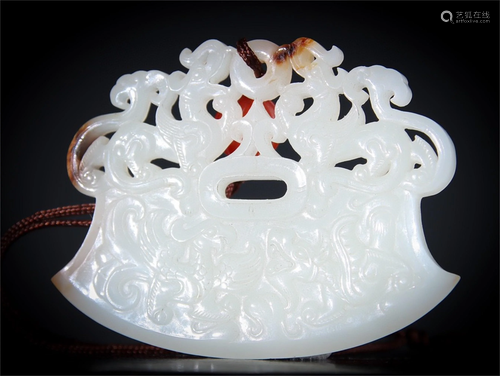 A Carved Jade Dragon Patterned Pendant