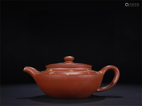 A Carved Yixing Zisha Teapot