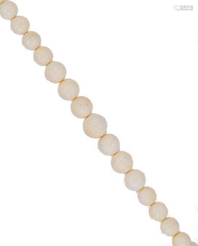 A white coral bead necklace,