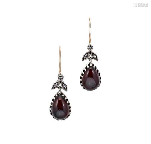 A pair of garnet and diamond ear pendants,