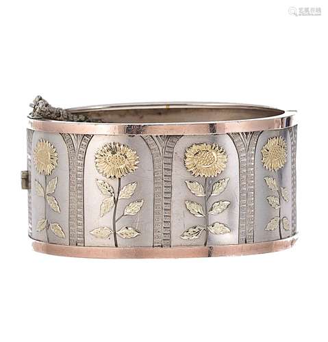 A floral cuff bangle,