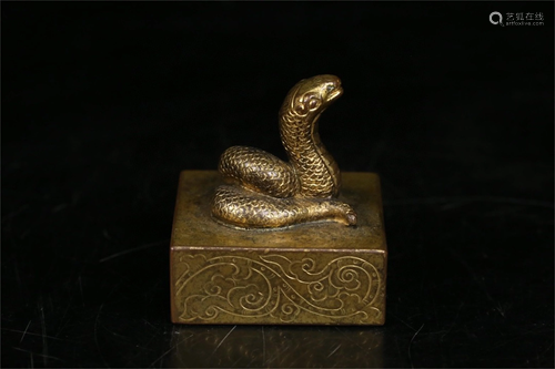 A Gilt Bronze Snake Topped Seal