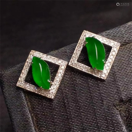 A Pair of Chinese Carved Jadeite Earrings