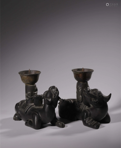 A Pair of Chinese Carved Hardwood Candlesticks