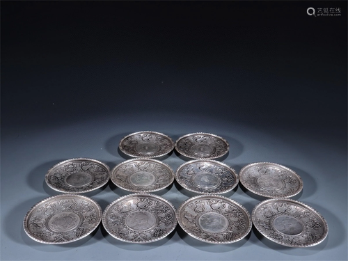 A Set of Chinese Silver Saucers