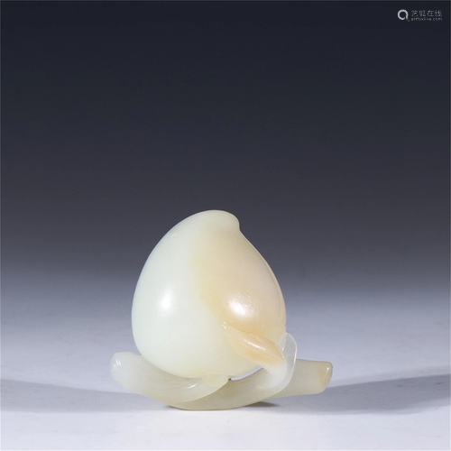 A Carved Jade Peach Shaped Ornament