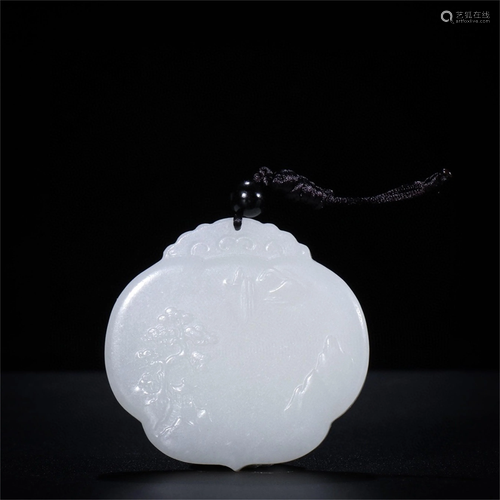 A Carved Jade Landscape Patterned Pendant