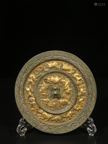 A Chinese Gilt Bronze Mirror