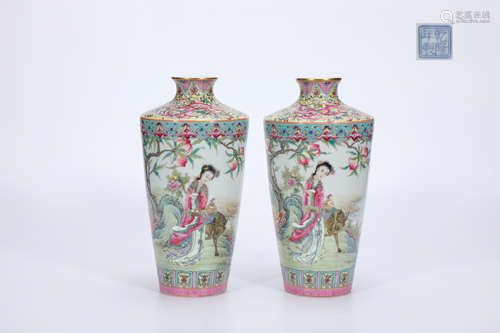 A pair of famille rose vases with flat shoulders