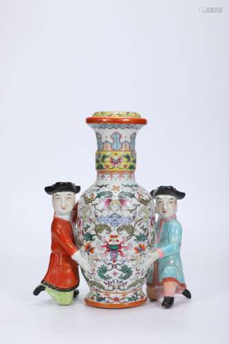 Tribute bottle with pastel flowers and carved figures