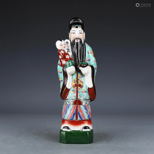 A CHINESE FAMILLE ROSE 'GOD OF PROSPERITY' STATUETTE