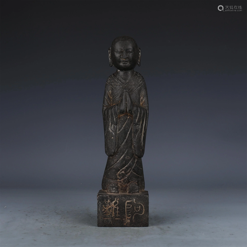 A CHINESE STANDING BUDDHIST FIGURE STATUETTE