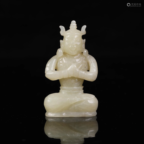 A CHINESE JADE CARVED BUDDHA STATUETTE