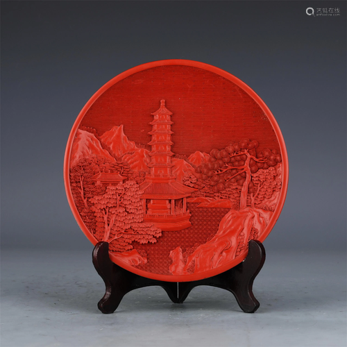 A CHINESE CARVED RED LACQUER LANDSCAPE PLATE