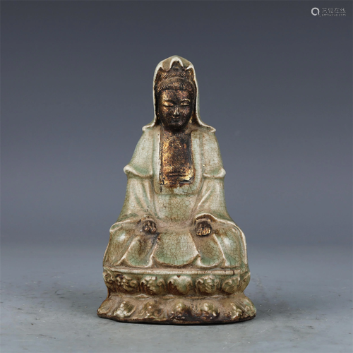 A CHINESE GUANYIN BUDDHA STATUETTE