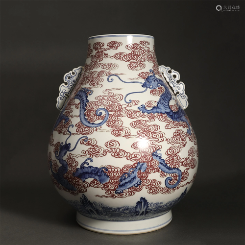 A CHINESE BLUE AND WHITE UNDER-GLAZE RED DRAGON VASE