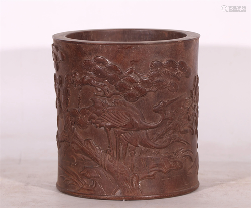 A CHINESE CARVED PINE-AND-CRANE ZITAN BRUSH POT