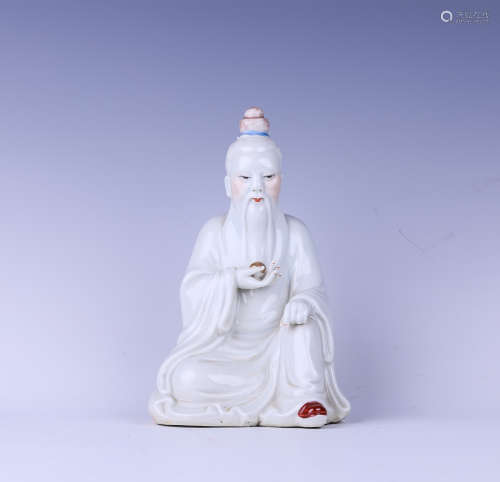 A white glazed figure