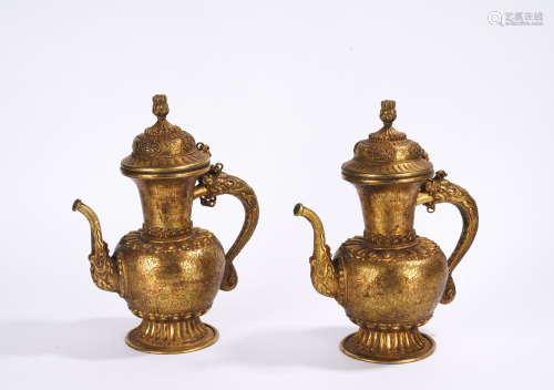 A pair of gilt-bronze pot