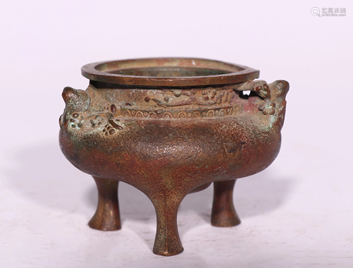 A CHINESE BRONZE TRIPOD CENSER WITH BEAST HANDLES