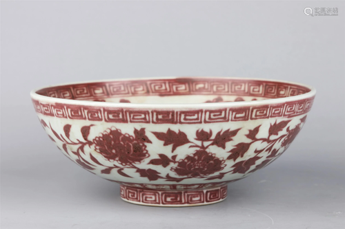 A CHINESE RED UNDERGLAZED PORCELAIN FLOWER…