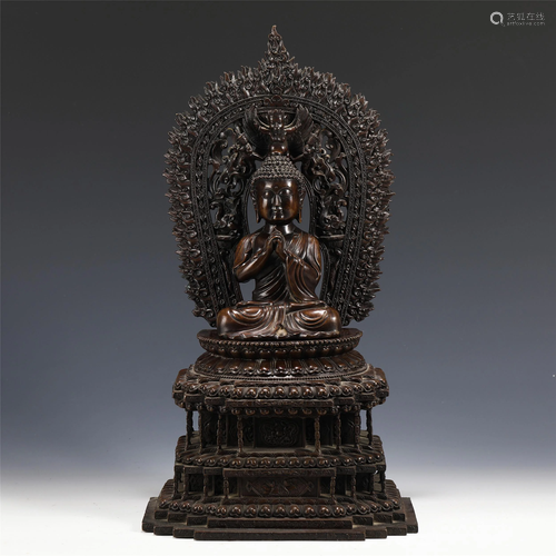 A CHINESE BRONZE BUDDHA STATUETTE