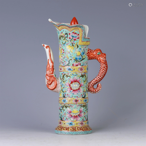 A CHINESE FAMILLE ROSE PORCELAIN FLORAL MONK'S CAP JUG