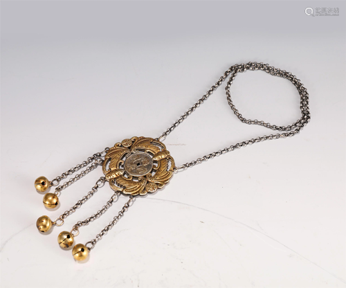 A CHINESE GILT SILVER NECKLACE DECORATION