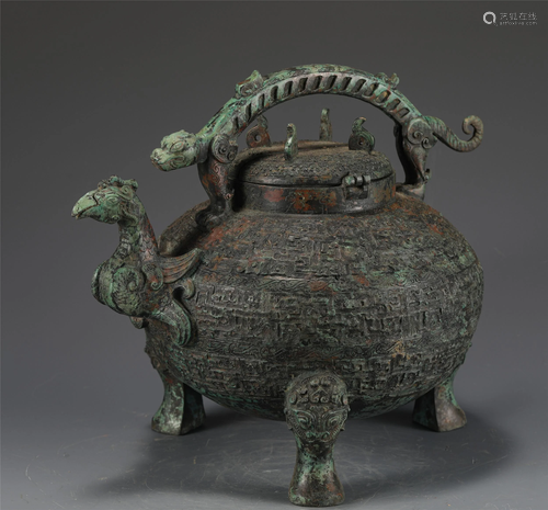 A CHINESE BRONZE TRIPOD RITUAL VESSEL