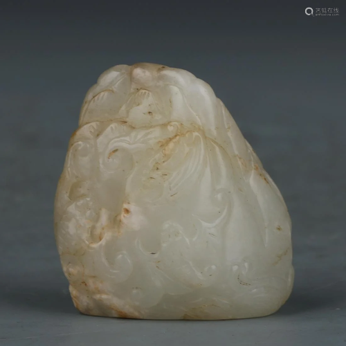 A CHINESE CARVED WHITE JADE ORNAMENTS