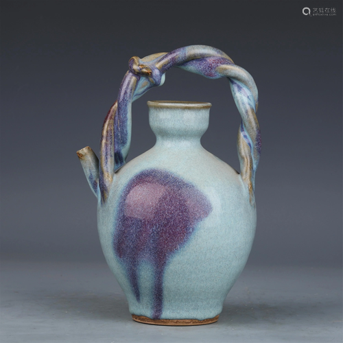 A CHINESE JUN TYPE GLAZED PORCELAIN LONG HANDLE EWER