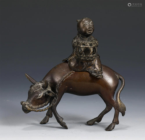 A CHINESE BRONZE FIGURE AND CATTLE INCENSE BURNER