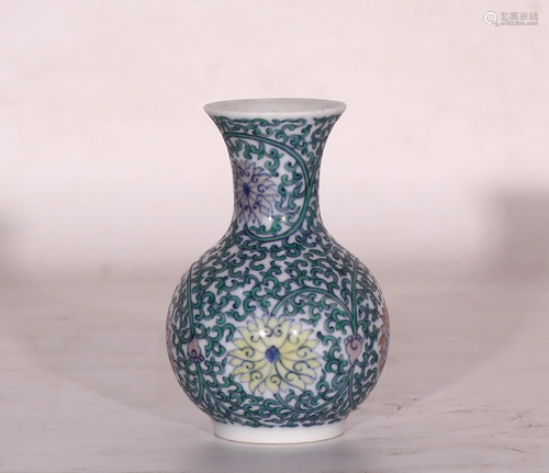 A CHINESE DOUCAI FLORAL GLOBULAR VASE