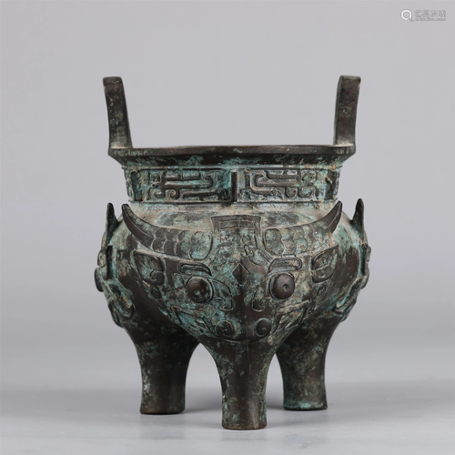 A CHINESE BRONZE TRIPOD DING STYLE CENSER