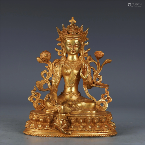 A CHINESE GILT BRONZE FIGURE OF BUDDHA SEATED STATUE