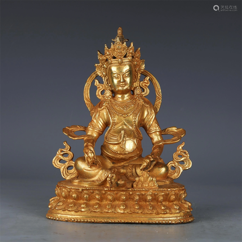 A CHINESE GILT BRONZE FIGURE OF BUDDHA SEATED STATUE