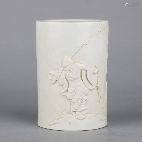 A CHINESE CARVED PORCELAIN BRUSH POT