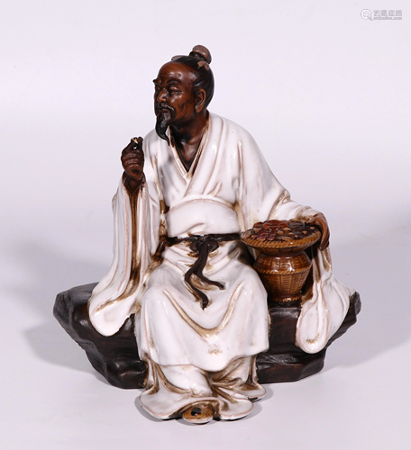 A CHINESE POLYCHROME YIXING CLAY PHARMACIST LI SHIZHEN