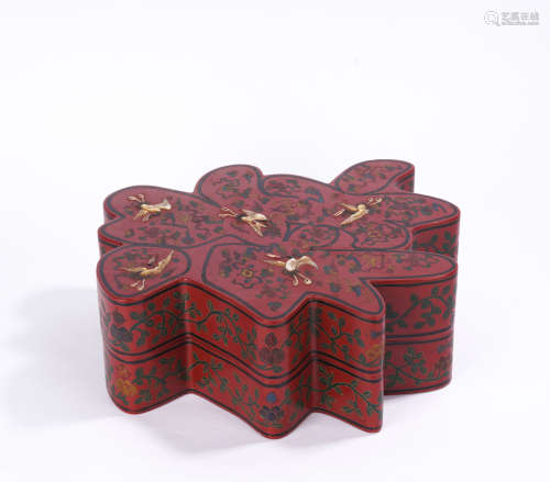 A carved lacquerware box and cover
