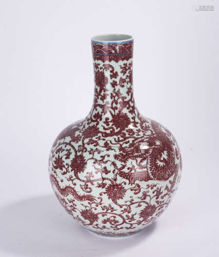 A copper-red-glazed 'dragon' globular vase